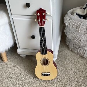 ukulele, used once or twice